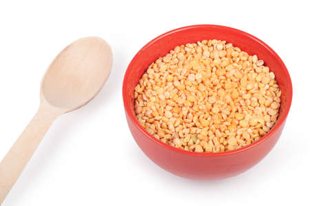 Raw split pea in plate isolated on whiteの写真素材