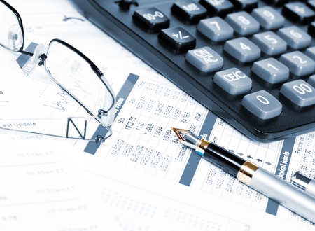 Business of financial analytics desktop with accounting charts and diagramsの写真素材