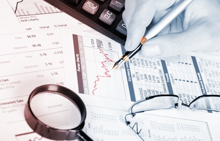 Business of financial analytics desktop with accounting charts and diagramsの写真素材