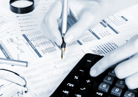 Business of financial analytics desktop with accounting charts and diagramsの写真素材