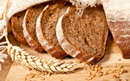 Fresh baked traditional bread and wheatの写真素材