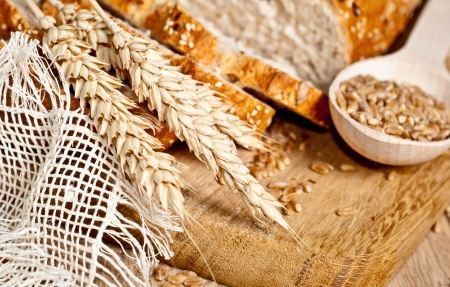 Fresh baked traditional bread and wheatの写真素材