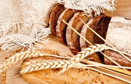 Fresh baked traditional bread and wheatの写真素材