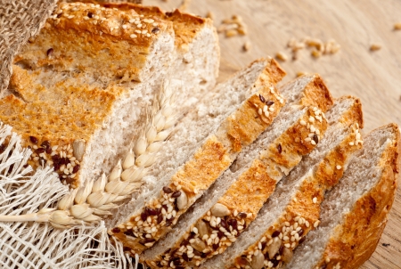 Fresh baked traditional bread and wheatの写真素材
