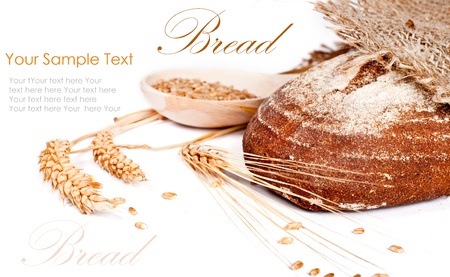 Fresh baked traditional bread and wheatの写真素材
