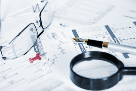 Business of financial analytics desktop with accounting charts and diagramsの写真素材