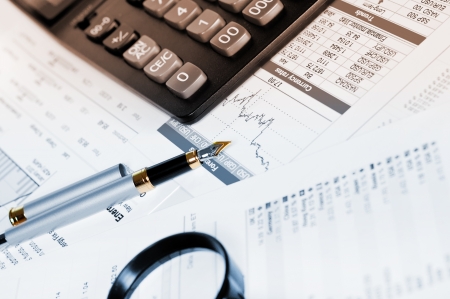 Business of financial analytics desktop with accounting charts and diagramsの写真素材
