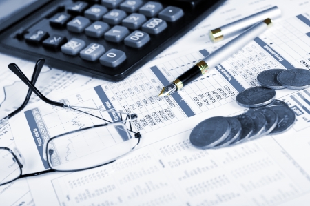 Business of financial analytics desktop with accounting charts and diagramsの写真素材