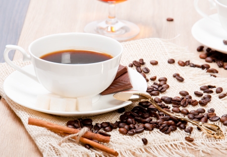 Coffee cup with coffee beansの写真素材