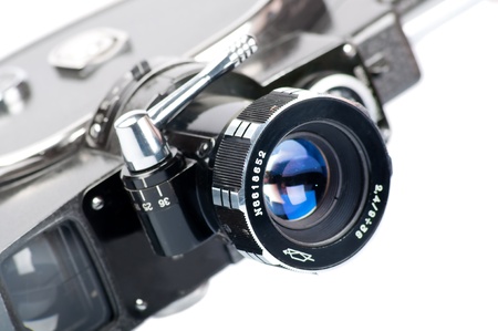 Vintage movie camera isolated on  whiteの写真素材