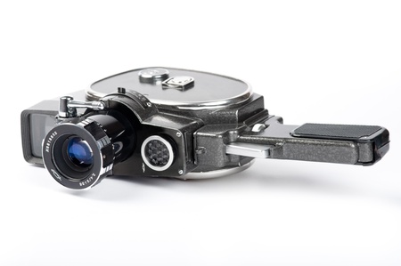 Vintage movie camera isolated on  whiteの写真素材