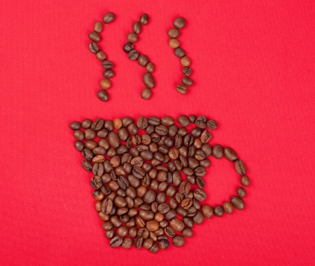 Coffee cup with coffee beansの写真素材