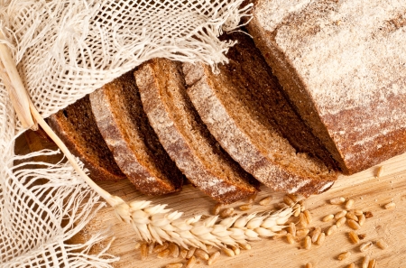 Fresh baked traditional bread and wheatの写真素材