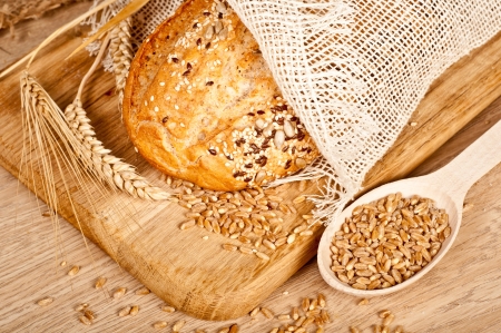 Fresh baked traditional bread and wheatの写真素材