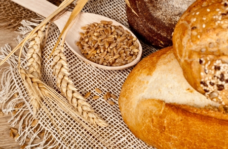 Fresh baked traditional bread and wheatの写真素材
