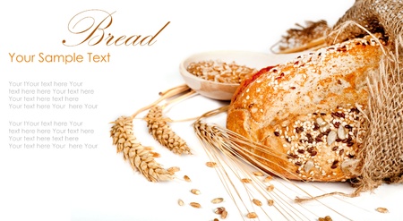 Fresh baked traditional bread and wheatの写真素材