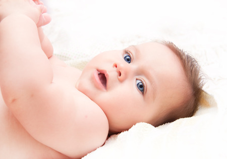 Little cute blue-eyed babyの写真素材
