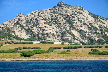 Landscape view: ancient jail constructions at the Asinara National Park, Asinara Island, Sardinia, Italyの写真素材