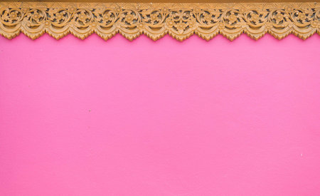 Pink concrete with Thai crafting woodの写真素材