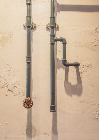 old gate valve on pipe connectionの写真素材