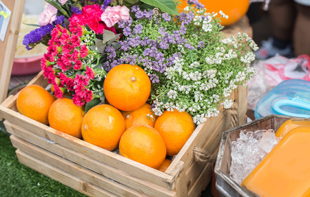 fresh tangerines oranges on marketの写真素材