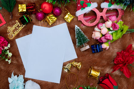 Mockup image of a blank white greeting card with christmas themed. A blank white paper decorated...