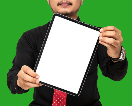 Image of a white blank screen tablet held by a man both handed for mockupの写真素材
