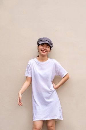 Portrait photography of an Asian woman with an enchanting smile, shirt dress mockup template imageの写真素材
