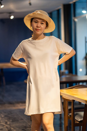 A stunning Asian woman captured in a beautiful pose for portrait photography, shirt dress mockup template imageの写真素材