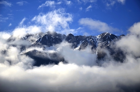 Panorama mountains in cloudsの写真素材