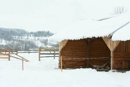 Stable for horses with a lot of snow in winterの写真素材