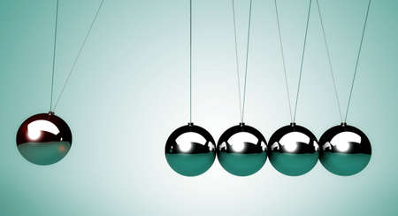 close up of the Newton's cradle, particularly of the spheresの写真素材