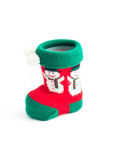 Christmas stocking with candy inside for a happy Christmasの写真素材