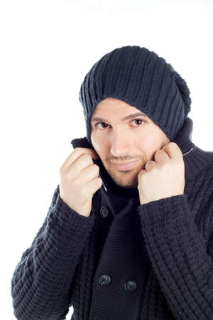 handsome guy in a dress and hat winter color blue on a white backgroundの写真素材