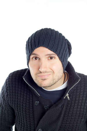 handsome guy in a dress and hat winter color blue on a white backgroundの写真素材