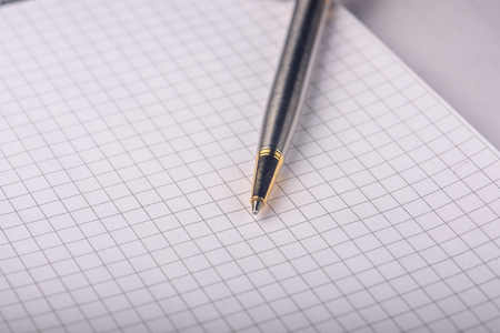 pen on a notebook close-upの写真素材
