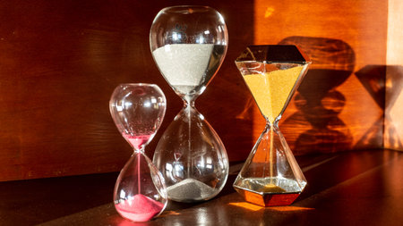 hourglasses on wooden furniture