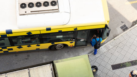 man entering an urban bus