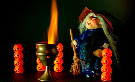 witch with hallowen pumpkinsの写真素材