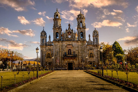 Christian pilgrimage center consisting of a Renaissance-style priedra basilica with gardens and a street leading to its front doorの写真素材