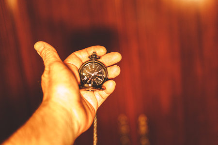 hand showing a watch