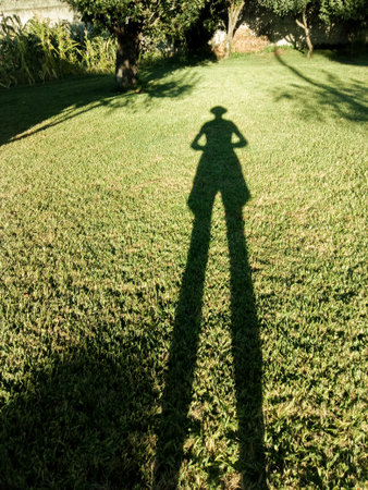 shadow of man at sunset