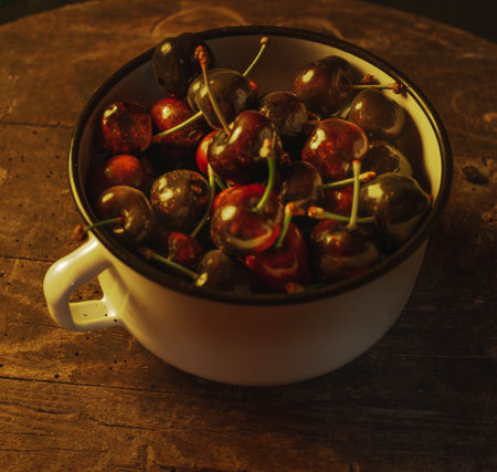 bowl with dark cherriesの写真素材