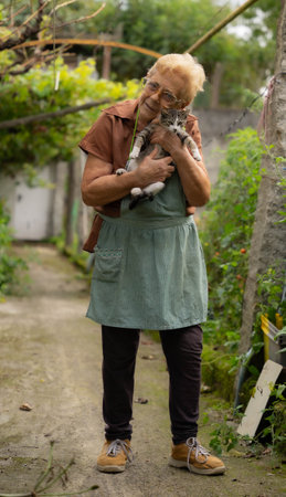 Old lady with catの写真素材