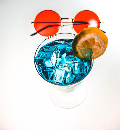 Colorful summer cocktail with retro sunglassesの写真素材