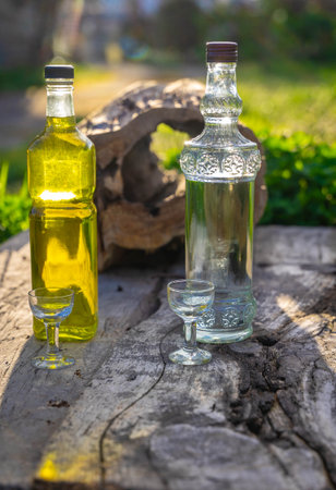 Liqueurs in a rustic natural environmentの写真素材