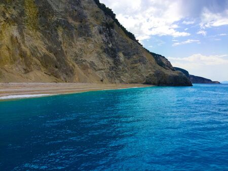 clear wavy blue sea water with turquoise huseの写真素材
