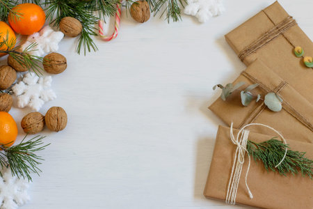 Zero waste ecological handmade gift boxes wrapped in recycled craft paper and decorated. Festive eco...