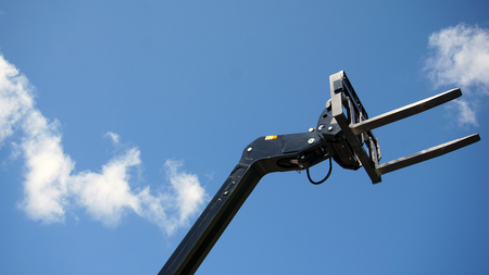 Forklift's head against blue skyの写真素材