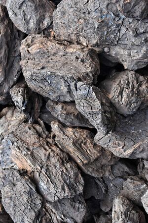 A pile of dry lignite coal ready for heating during winterの写真素材